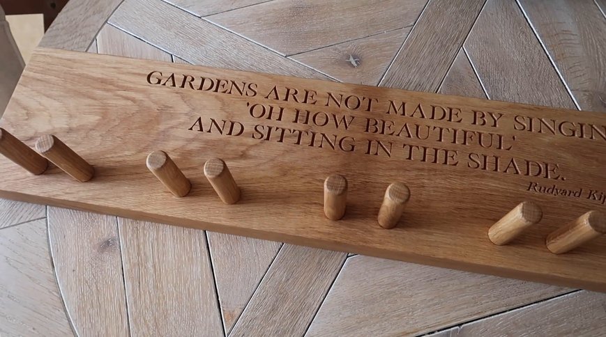 The Tool Shed Peg Rail, carved with Rudyard Kipling's words. Still: Josie Irons on YouTube
